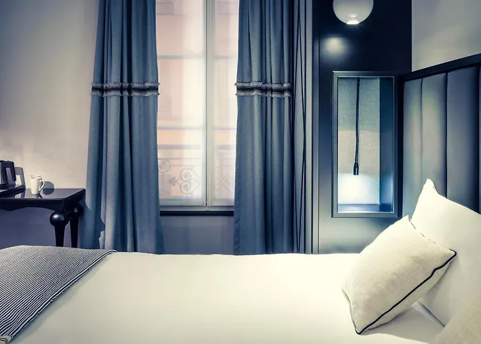 Отель Mercure Arc De Triomphe Wagram