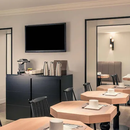Отель Mercure Arc De Triomphe Wagram 4*